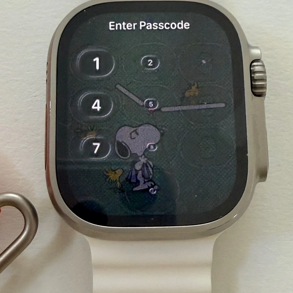 Apple Watch Ultra 1st Gen Smartwatch with White, Orange, and Yellow Bands